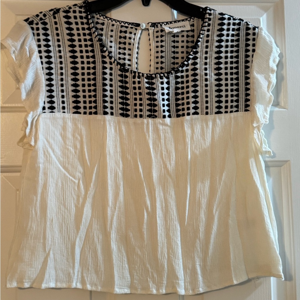 Elegant Black and White Patterned Blouse